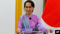 Myanmar's State Counselor and Foreign Minister Aung San Suu Kyi speaks to the media during a joint press conference with Japanese Foreign Minister Taro Kono at the Ministry of Foreign Affairs in Naypyitaw, Jan. 12, 2018.
