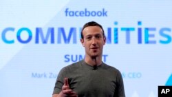 FILE - Facebook CEO Mark Zuckerberg speaks in preparation for the Facebook Communities Summit, in Chicago, Illinois, June 21, 2017.
