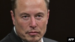 (FILES) SpaceX, Twitter and electric car maker Tesla CEO Elon Musk looks on as he speaks during his visit at the Vivatech technology startups and innovation fair at the Porte de Versailles exhibition center in Paris, on June 16, 2023.