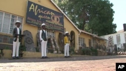 Reine Osso runs the "African Queen" Arts and Crafts store in Johannesburg, South Africa