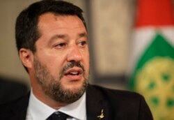 FILE - The League party leader Matteo Salvini talks to the press after meeting Italian President Sergio Mattarella, in Rome, Aug. 22, 2019.