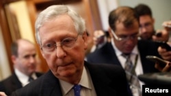 FILE - Senate Majority Leader Mitch McConnell speaks to reporters on Capitol Hill in Washington, Nov. 9, 2017.
