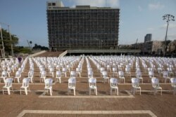 One thousand chairs symbolizing people who died from the coronavirus are placed at the Rabin Square in Tel Aviv, Israel, Sept. 7, 2020.