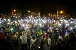 Demonstrators chant slogans during a Black Lives Matter protest at the Mark O. Hatfield United States Courthouse, July 29, 2020, in Portland, Oregon.