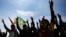 FILE - Supporters of pro-Kurdish Peoples' Equality and Democracy Party (DEM Party) chant slogans during the Newroz celebrations, in Istanbul, Turkey, on March 17, 2024. 