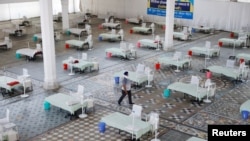 Beds are seen inside a Gurudwara (Sikh Temple) converted into a coronavirus care facility amidst the spread of COVID-19 in New Delhi, India, May 5, 2021. 