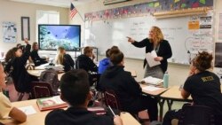 This undated photo, provided by the Connecticut Education Association, shows English teacher Meghan Hatch-Geary, the 2020 Connecticut Teacher of the Year, at Woodland Regional High School, in Beacon Falls, Conn.