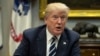 FILE - President Donald Trump speaks during a prison reform roundtable in the Roosevelt Room of the Washington, Jan. 11, 2018. 