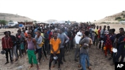 Ethiopian refugees gather in Qadarif region, eastern Sudan, Nov. 17, 2020.