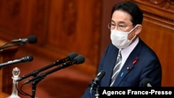 Japan's new Prime Minister Fumio Kishida delivers his first policy speech at the lower house of parliament in Tokyo on Oct. 8, 2021.