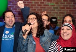Democratic U.S. congressional candidate Rashida Tlaib celebrates with her mother at her midterm election night party in Detroit, Michigan, Nov. 6, 2018.