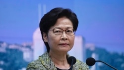 FILE - Hong Kong Chief Executive Carrie Lam listens to reporters' questions during a press conference in Hong Kong, Aug. 17, 2021.