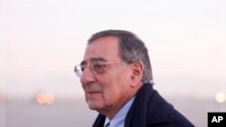 Defense Secretary Leon Panetta walks across the tarmac upon his arrival in Kabul, Dec., 13, 2011