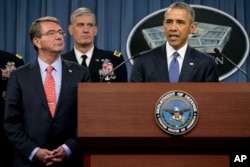 President Barack Obama, right, speaks to the media after receiving an update from military leaders on the campaign against the Islamic State, during a rare visit to the Pentagon, July 6, 2015. Defense Secretary Ash Carter is at left.