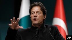 FILE - Pakistan's Prime Minister Imran Khan speaks during a joint news conference with Turkey's President Recep Tayyip Erdogan, in Ankara, Turkey, Jan. 4, 2019.