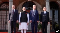 FILE - President Joe Biden greets, from left, Australia's Prime Minister Anthony Albanese, India's Prime Minister Narendra Modi, Biden, and Japan's Prime Minister Fumio Kishida, at the Quad leaders summit in Claymont, Del., Sept. 21, 2024.