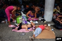 Honduran migrants rest in Tapachula, Chiapas state, Mexico, Oct. 21, 2018.