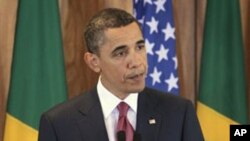 US President Barack Obama makes a statement on the ongoing showdown in Libya, during his news conference at the Palacio do Planalto in Brasilia, Brazil, March 19, 2011