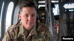 Nevada Army National Guard Sergeant Sam Hunt, an electrician with G Company, 2/238th General Support Aviation Battalion, is pictured in Stead, Nevada, May 12, 2017. Hunt learned this month that the Defense Department had approved his transition to male from female, and he said he intends to continue his service "until told otherwise."