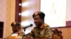Sudan's ruling Military Council spokesperson Shamseddine Kabbashi makes a speech as he holds a press conference at the Presidential Palace in Khartoum, Sudan, Thursday, June 13, 2019.