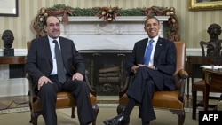 Tổng thống Hoa Kỳ Barack Obama và Thủ tướng Iraq Nouri al-Maliki thảo luận tại Tòa Bạch Ốc ở Washington, 12/12/2011