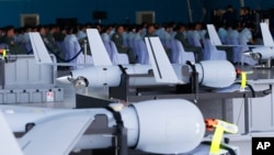 FILE - U.S. ScanEagle drones are lined up on March 13, 2018, at Villamor Air Base in suburban Pasay city, southeast of Manila, Philippines.