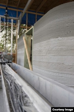 This photo shows the process of creating a home with 3D printing technology. Builder ICON and not-for-profit group New Story are teaming up to provide a quick, cheap housing solution for the millions of people who need it most. (ICON/New Story)
