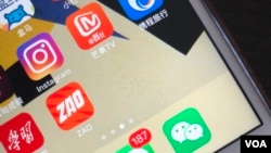 FILE - The Chinese app Zao, which was removed from app stores in 2019, lets users swap their faces with celebrities or anyone else in a video clip.