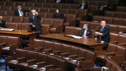 FILE - In this image from video, Rep. Kevin Brady, R-Texas., recognizes Rep. Steve Chabot, R-Ohio, left, to speak on the floor of the House of Representatives at the U.S. Capitol in Washington, April 23, 2020.