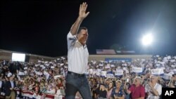 Republican presidential candidate and former Massachusetts Gov. Mitt Romney campaigns at D’Evelyn High School in Denver, September 23, 2012.