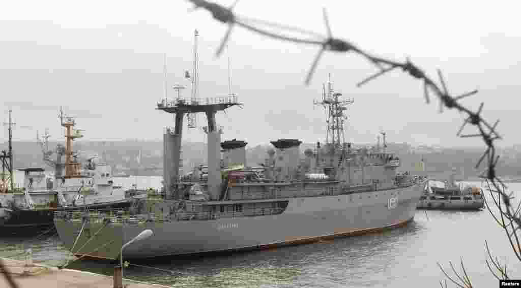 The Ukrainian ship Slavutich is seen blocked by two Russian ships at the harbor in Sevastopol, March 20, 2014.