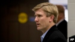 Nick Ayers, center, Vice President Mike Pence's chief of staff, arrives for a news conference with President Donald Trump and Republican congressmen at Camp David, Maryland, Jan. 6, 2018.
