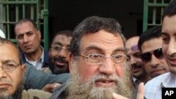Aboud el-Zomour, member of Egypt's Islamic Jihad group, gestures upon his release from Tora prison in Cairo, Egypt, Saturday, March 12, 2011