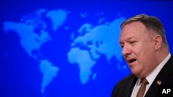 Secretary of State Mike Pompeo speaks during a news conference at the State Department on Wednesday, March 25, 2020, in Washington.
