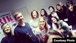 Staff members at investigative news outlet KRIK are seen in this undated photo. The site’s editor-in-chief says pro-government media in Serbia are trying to falsely link the media outlet to a criminal network. (Photo courtesy of KRIK) 