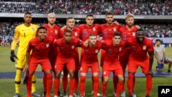 United States men's soccer players pose for a picture before the 2019 Gold Cup final football match between USA and Mexico on July 7, 2019.