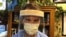 Dr. Gerry Gacioch wears a face shield made by temple volunteers at Rochester General Hospital, April 13, 2020. (Photo courtesy of Dinh Tran Tuan)
