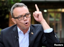 Venezuelan opposition activist Salvatore Lucchese speaks during an interview with Reuters in Bogota, Colombia Aug. 6, 2018.