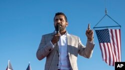 FILE - Kash Patel, former chief of staff to Acting Secretary of Defense Christopher Miller, speaks at a rally in Minden, Nevada, Oct. 8, 2022.