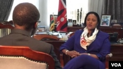 Facebook CEO and Harvard dropout Mark Zuckerberg, right, gestures as actor James Earl Jones, left, looks on while seated on stage during Harvard University commencement exercises, in Cambridge, Massachusetts. Zuckerberg was presented with an honorary Doctor of Laws degree and gave a commencement address.