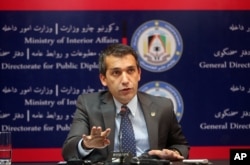 Sediq Sediqi, spokesman for the Afghan interior ministry, speaks with news media about a militant pre-dawn attack in Kunduz, at the interior ministry in Kabul, Afghanistan, Sept. 28, 2015.