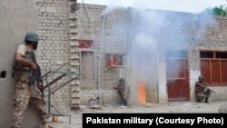 In undated photos, Pakistani troops are shown raiding and searching suspected militant places in North Waziristan during the so-called "Zarb-e-Azb" counter-militancy operations.