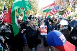 Protesters rally against the Washington visit of Turkish President Recep Tayyip Erdogan outside the White House, Nov. 13, 2019, in Washington.