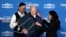 Interior Secretary Deb Haaland, right, and Bryan Newland, assistant secretary for Indian Affairs at the Department of the Interior, present President Joe Biden with an Eighth Generation blanket at the 2024 White House Tribal Nations Summit in Washington, Dec. 9, 2024.