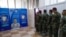 FILE - Kurdish Peshmerga soldiers take part in a voting simulation to test the efficiency of the system and the tools, ahead of Kurdistan parliamentary elections scheduled for October 2024, in Irbil on Aug. 29, 2024.