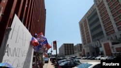 Messages to a prisoner are seen on a wall across the street from The Metropolitan Detention Center (MDC) where Ghislaine Maxwell has been moved, in the Brooklyn borough of New York City, July 6, 2020.