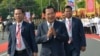 Cambodian Prime Minister Hun Sen, center, greets his government officers during the country's 66th Independence Day from France, at the Independence Monument in Phnom Penh, Cambodia, Nov. 9, 2019.