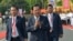 Cambodian Prime Minister Hun Sen, center, greets his government officers during the country's 66th Independence Day from France, at the Independence Monument in Phnom Penh, Cambodia, Nov. 9, 2019.