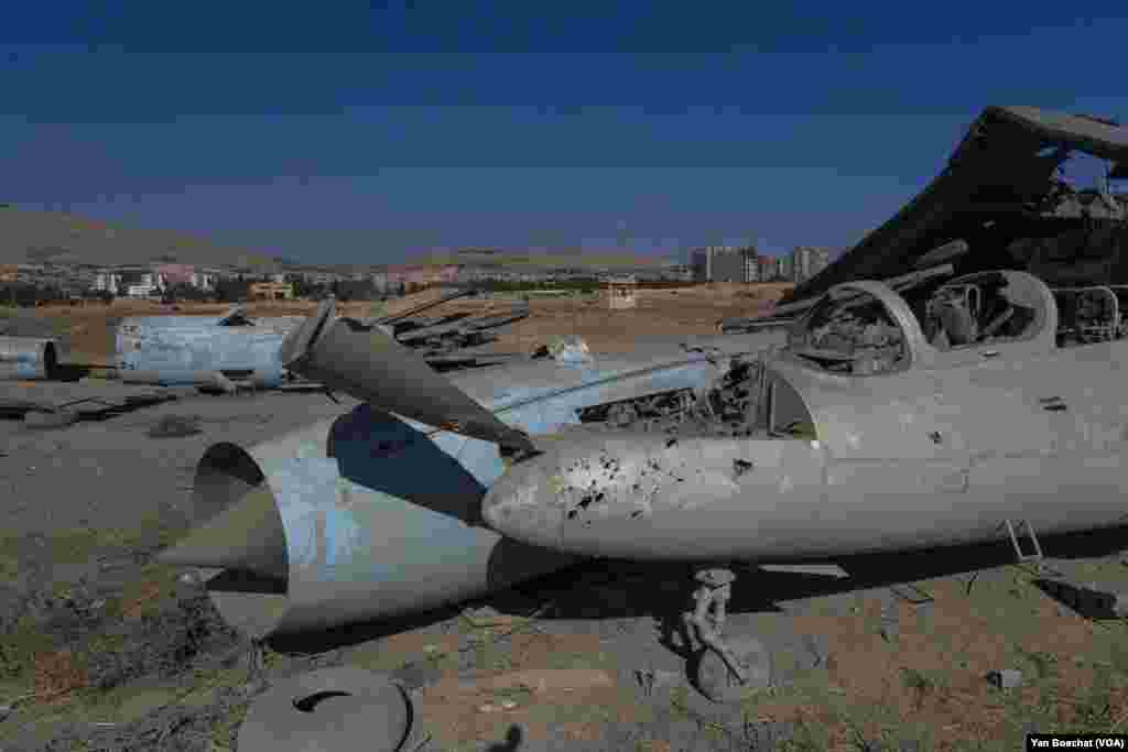 Old airplanes from the Soviet era that were stationed at the Mazzeh air base were also destroyed by Israeli air strikes, in Damascus, on Dec. 19, 2024. (Yan Boechat/VOA)