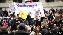 Protestors gather in Trafalgar Square, during a coronavirus anti-lockdown protest, in London, Oct. 24, 2020.